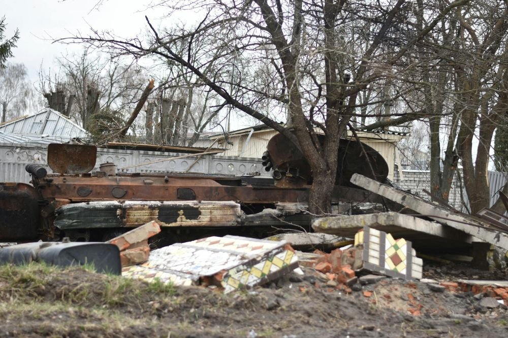 Debris and rubble scattered in front of a house, showcasing demolition services in Honolulu, HI.